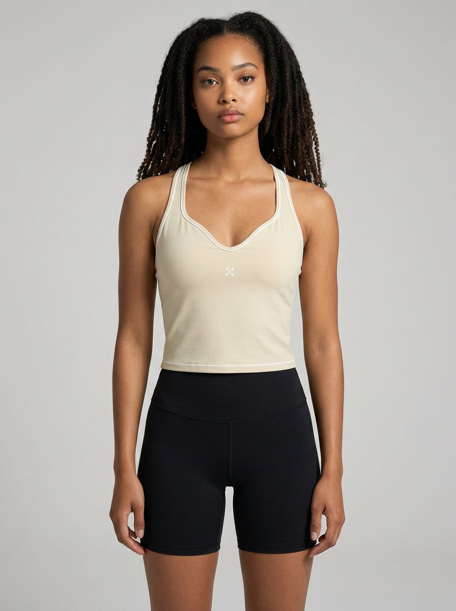 EHG SmartWellness beige yoga tank top with U-neck, skinny straps, and visible topstitching on a model.