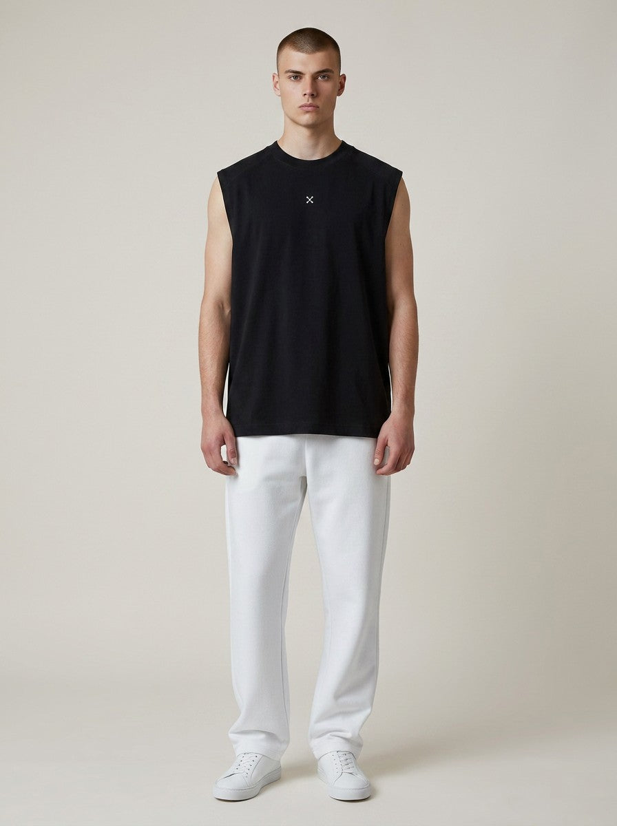 A male model wearing an EHG SmartWellness black heavyweight cotton tank top with a round neck and loose fit.