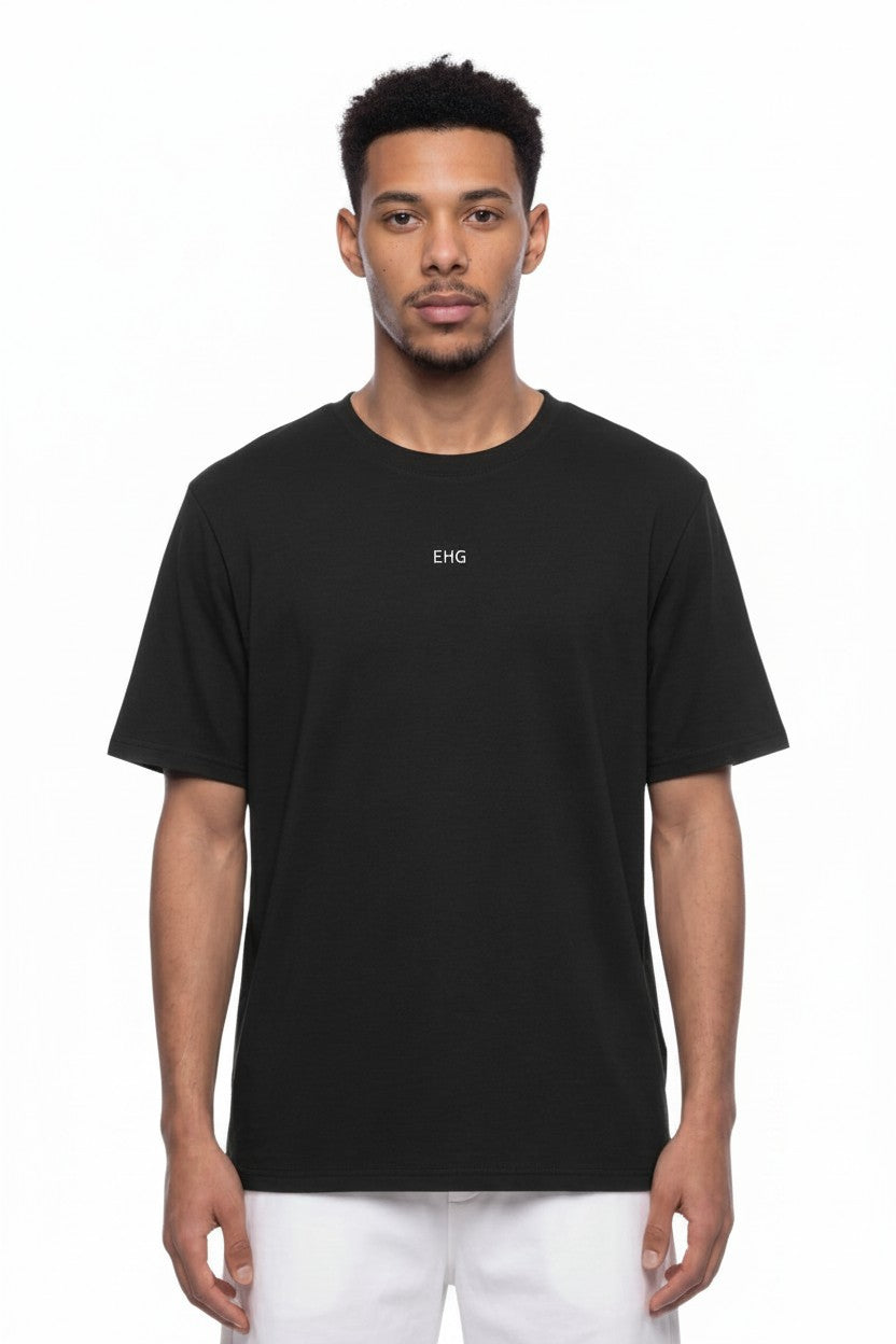 Model wearing a black EHG SmartWellness regular fit training tee with a round neck and small chest logo