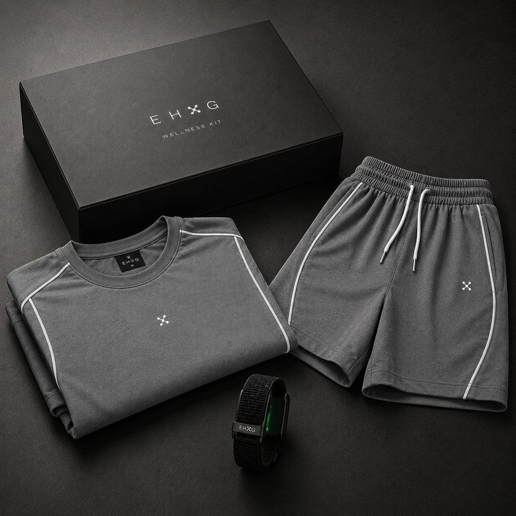 EHG SmartWellness Everyday Kit featuring a grey boxy piping t-shirt, drawstring shorts, and a black smart band.