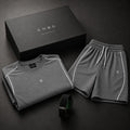 EHG SmartWellness Everyday Kit featuring a grey boxy piping t-shirt, drawstring shorts, and a black smart band.