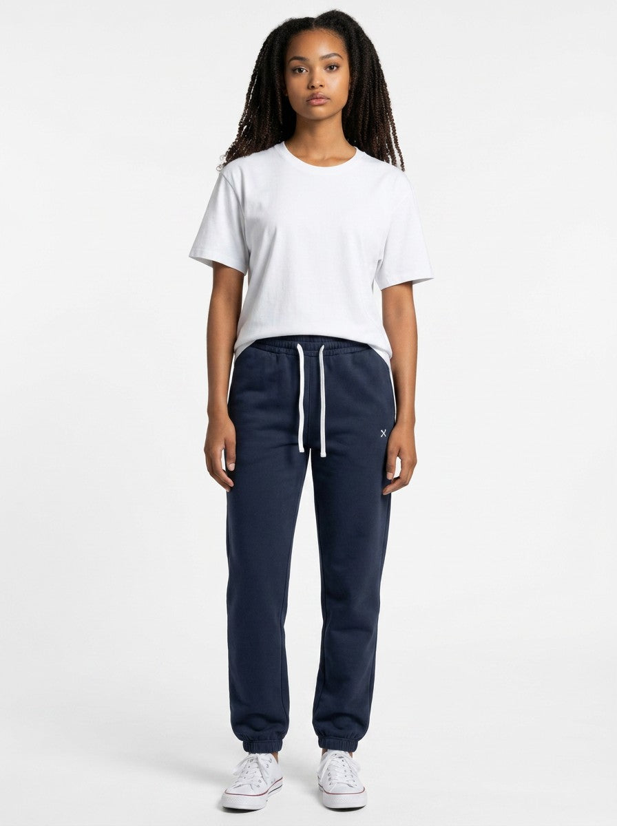 Model wearing EHG SmartWellness navy blue heavyweight cotton sweatpants with a drawstring waist and white t-shirt