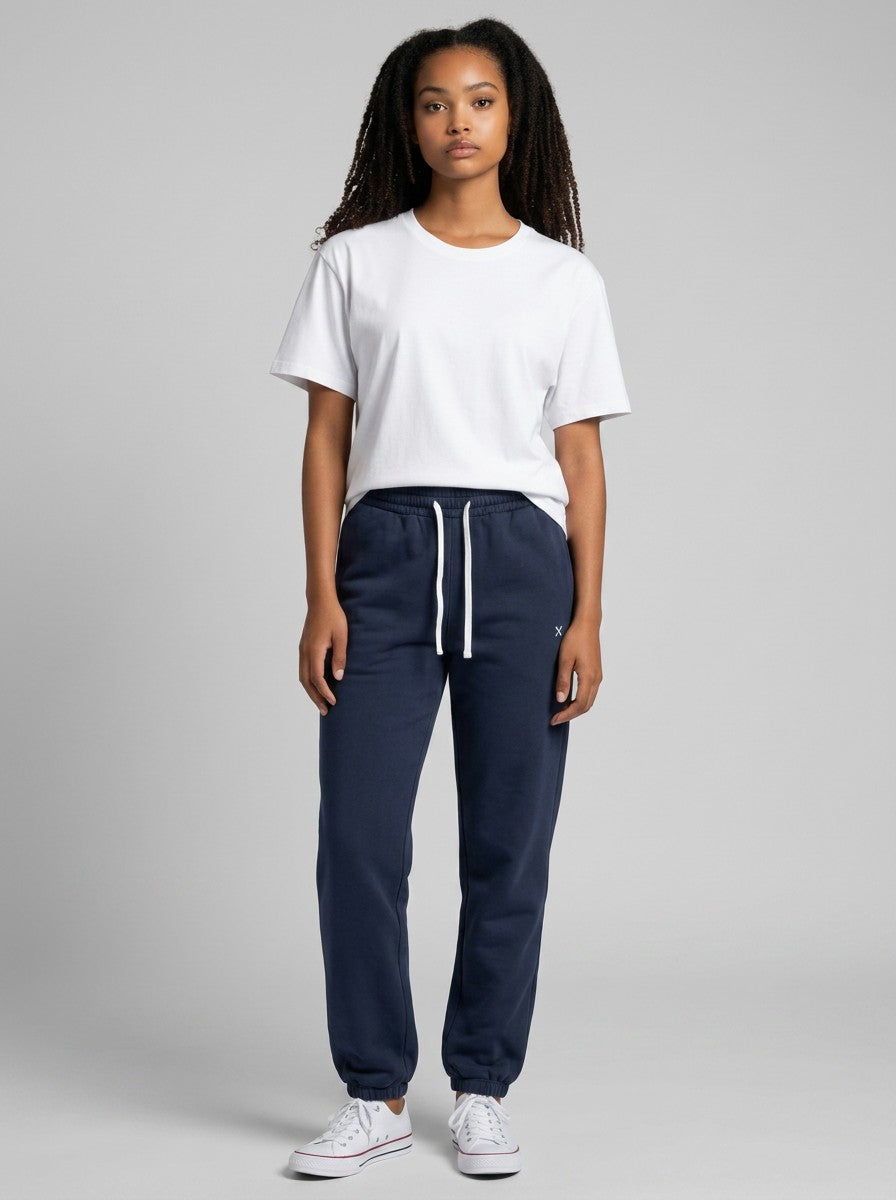 Model wearing EHG SmartWellness navy blue heavyweight cotton sweatpants with a white drawstring and relaxed fit.
