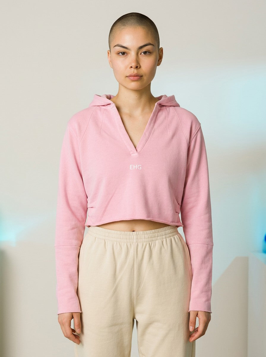 EHG SmartWellness vintage washed pink cropped hoodie with raw edge hem and V-neck worn by a model