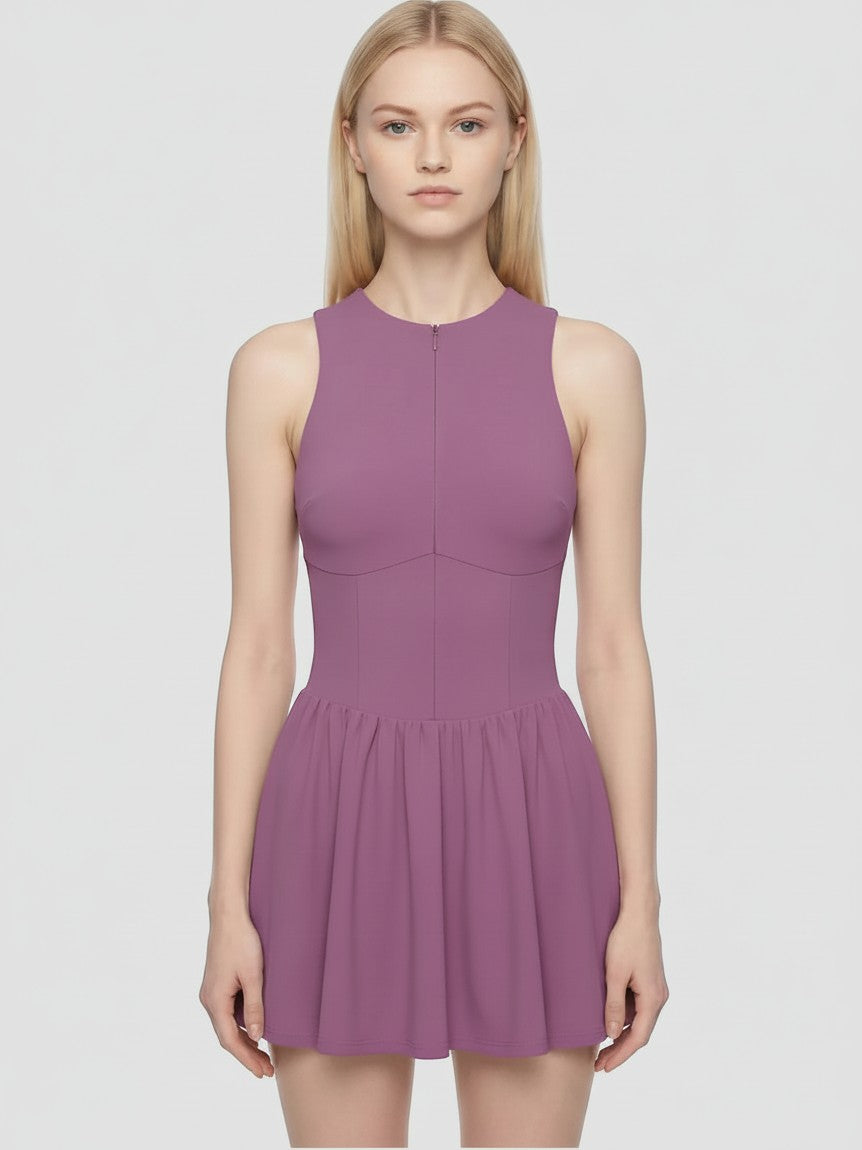 Model wearing EHG SmartWellness purple sleeveless ruched full-zip dress with a flattering fit and round neckline.